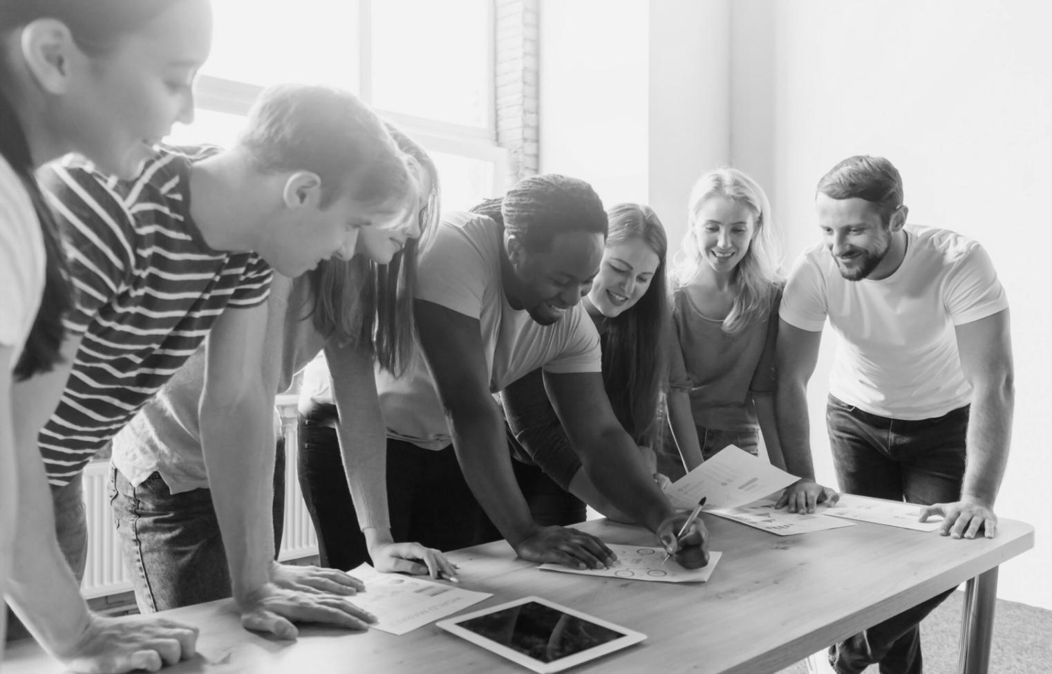 Financial analysis workshop with students working on capital budgeting projects